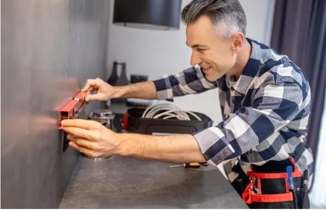 Kitchen fitting contractor at work